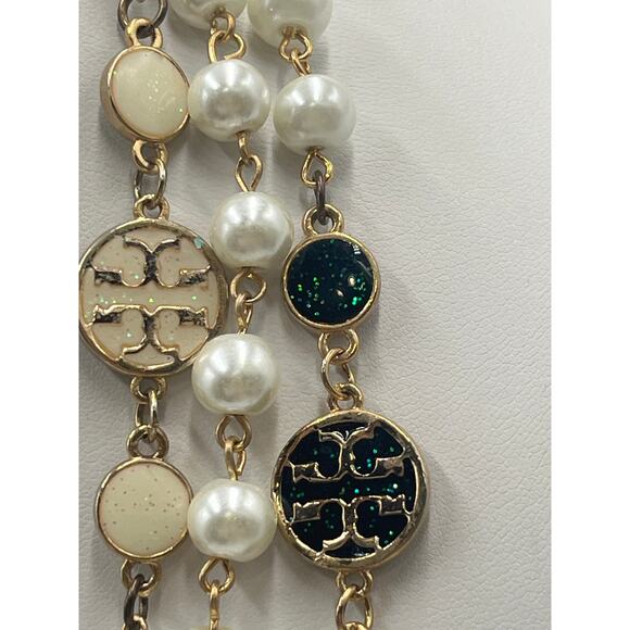 Tory Burch Authentic Long
Pearl Logo Medallion
Multi-Strand Gold 60" Necklace - Picture 11 of 15